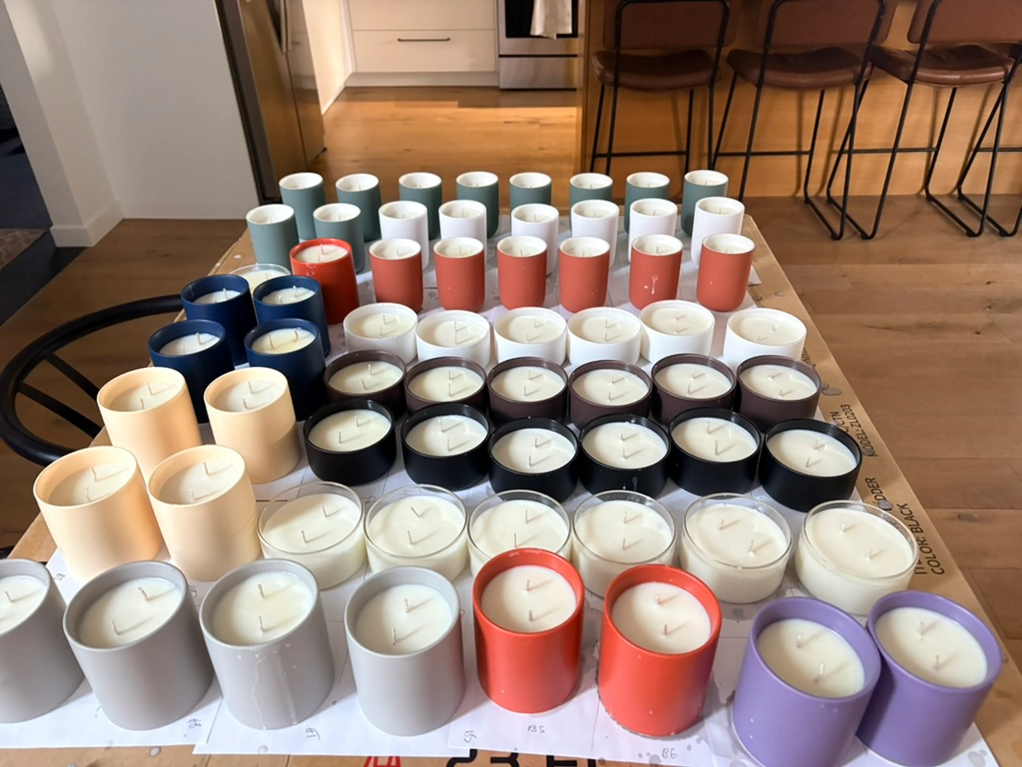 Hand-poured Hartisans soy candles on the kitchen island in Durango, Colorado
