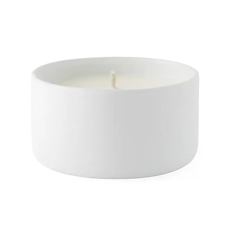 An ivory Hartisans candle sized for a quiet room